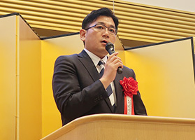 飯塚 真規氏